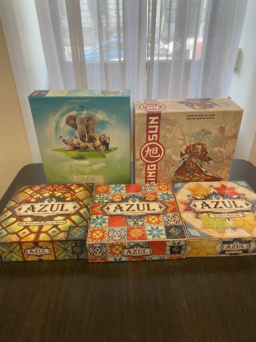 Настільні ігри: Плоский мир, гвинт, нерошима, азул