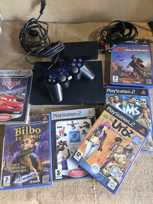 Ps2  com jogos  a.funcionar