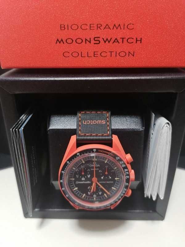 Lava x Omega Swatch SO33O100 – Płynna Moc