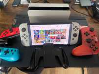 Switch OLED + chip + gry + 2 pady + dock + karta
