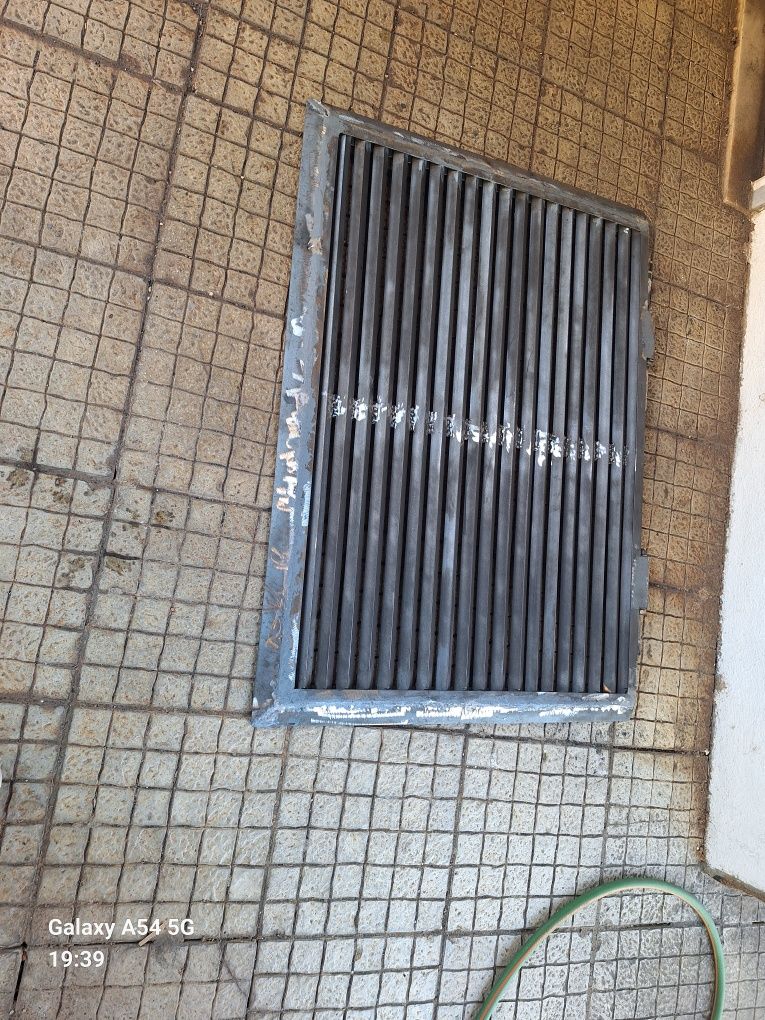 Tapete em grelha de ferro
