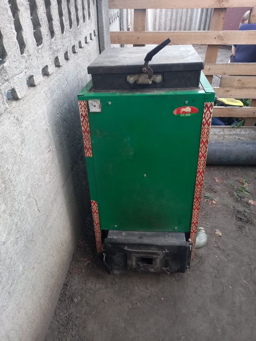 Продам твердотопливный котёл зубр 15кв