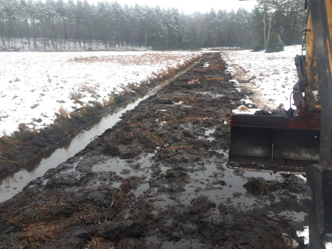 Prace ziemne spych koparka long  kopanie stawów  rozbiórki wyburzenia.