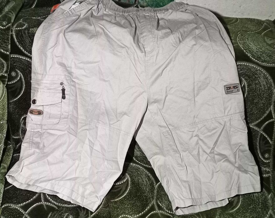 Новые мужские длинные шорты-бриджи серо-бежевые.