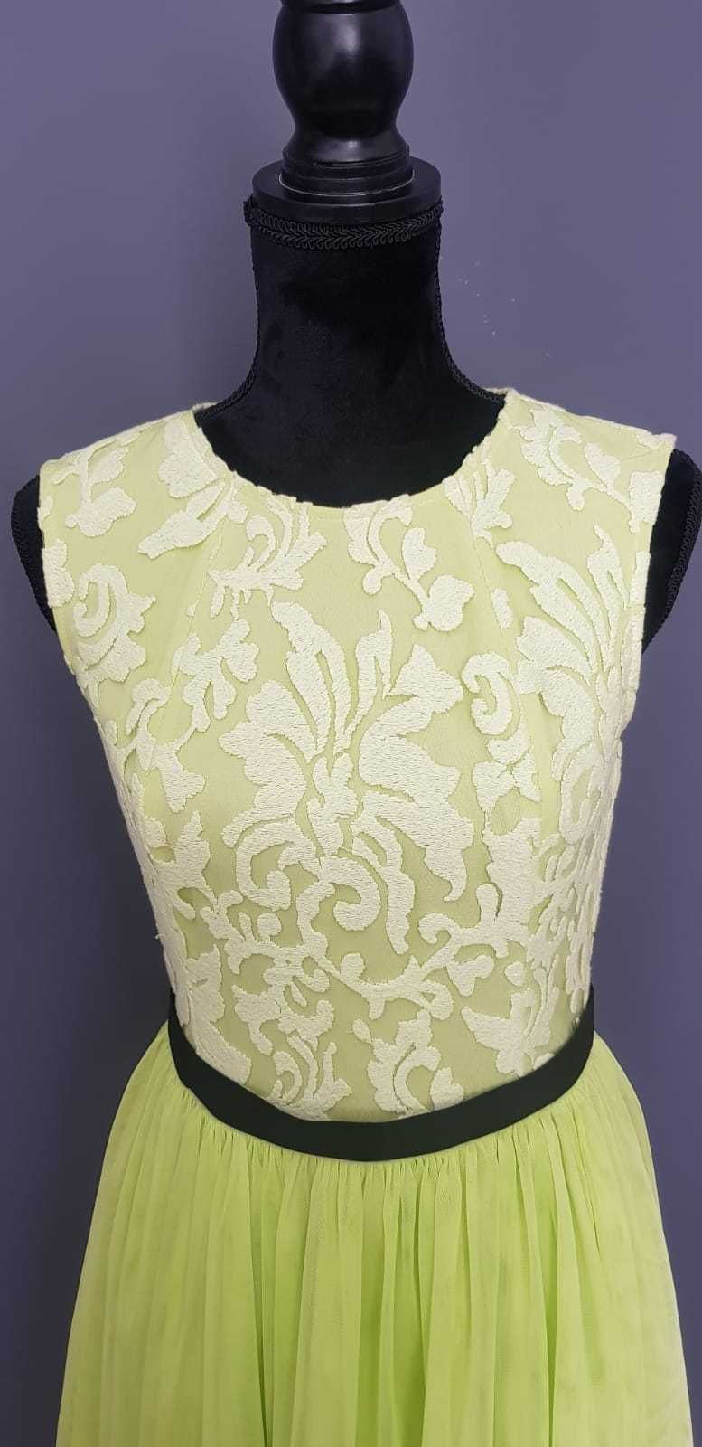 Piękna limonkowa sukienka na różne okazje rozmiar 40.Firma Emu