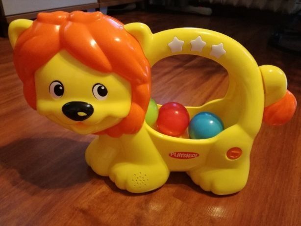 Zabawka interaktywna,kreatywna Playskool lew z piłeczkami,lew kuleczka