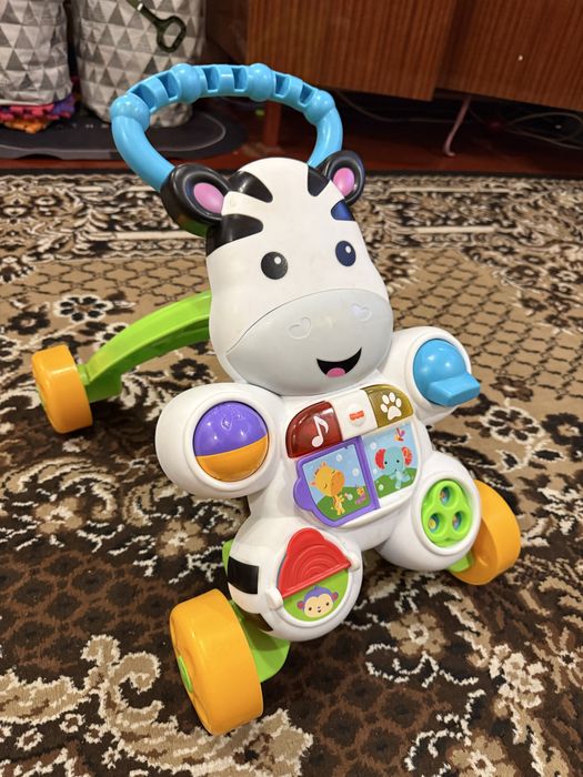 Ходунки-толкатор,розвиваючий, музичний центр Fisher-price