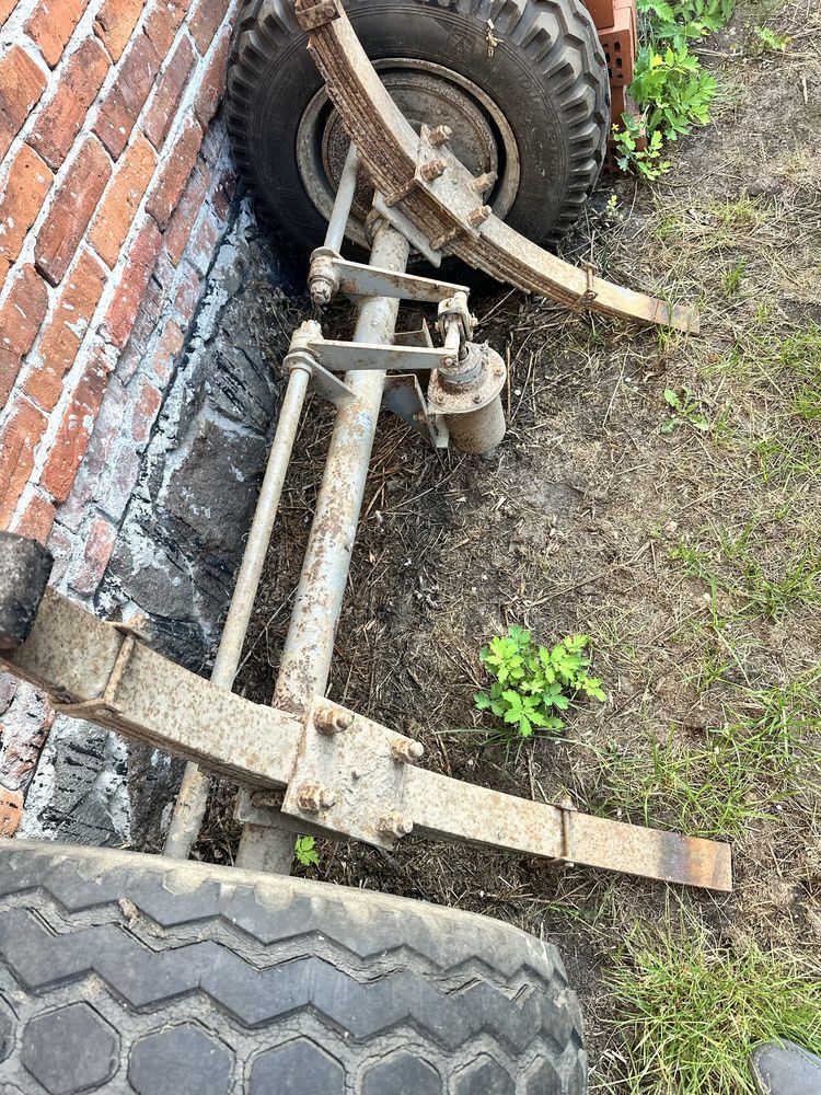 Oś od rozrzutnika na przyczepe