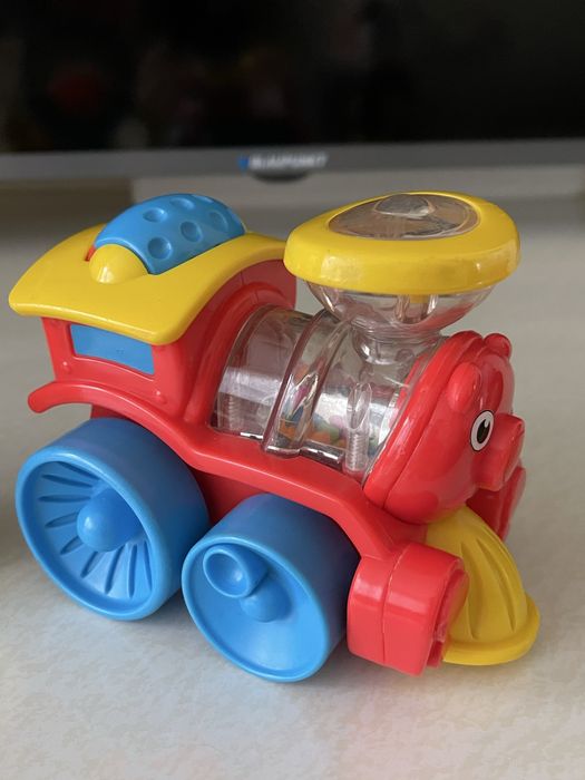 Дитяча іграшка розвиваюча брязкальце на присосці fisher price