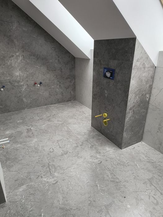 Glazurnik, fliziarz, układanie płytek, remonty łazienek, wykończenia,