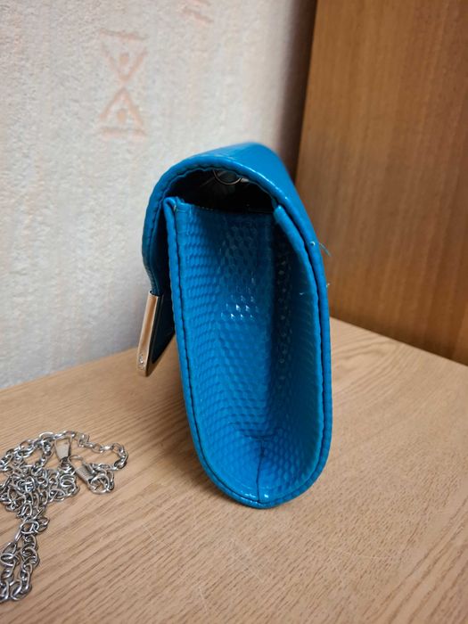 Сумка-клатч бирюзового цвета