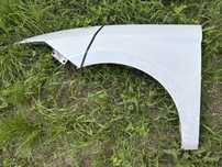 Błotnik nadkole lewy lewe Seat Leon 5f biały LS9R Nevada White