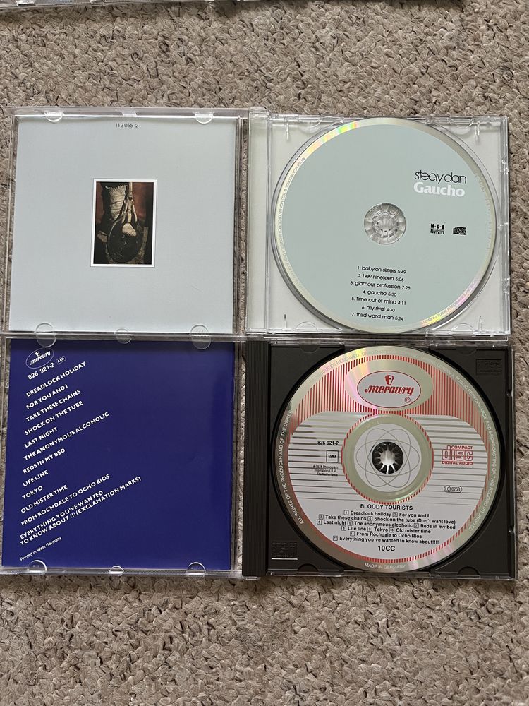 Диски фірмові CD Steely Dan, ELO, 10cc, Dire Straits, Santana, Beatles