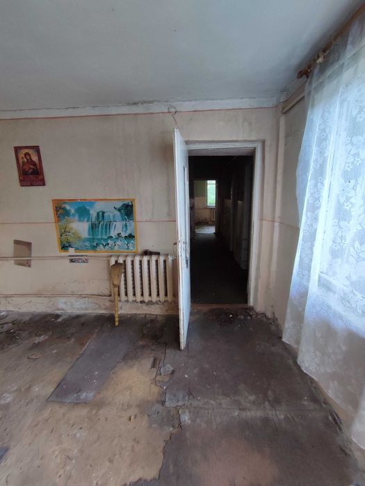 Півбудинка з окремою ділянкою і двором в центрі міста