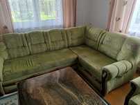 Sofa i fotel w zielonym kolorze. Rozkladane