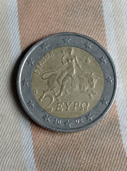 Продам коллекционые 2 евро Греция 2002г, с буквой S в нижней звезде