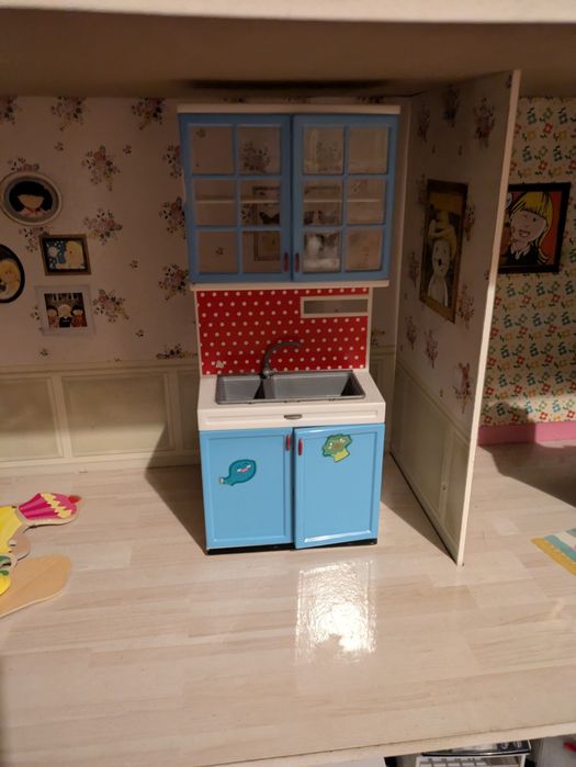 Casa de bonecas usada