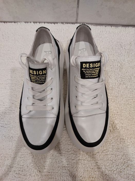 Білі шкіряні кеди