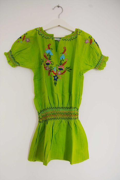 Túnica com motivos florais bordados da Antimilk (8 anos)