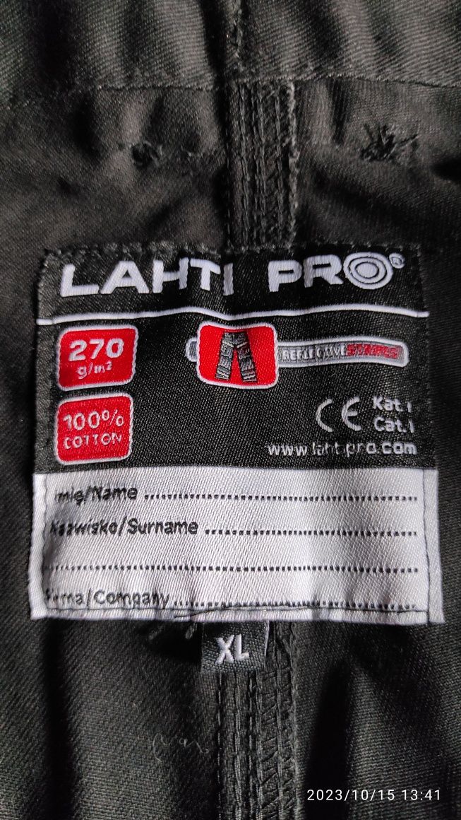 Spodnie robocze Lahti pro monterskie XXL 24 kiesz. Czołówka 300lm grat