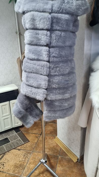 Норкрвая голубая жилетка