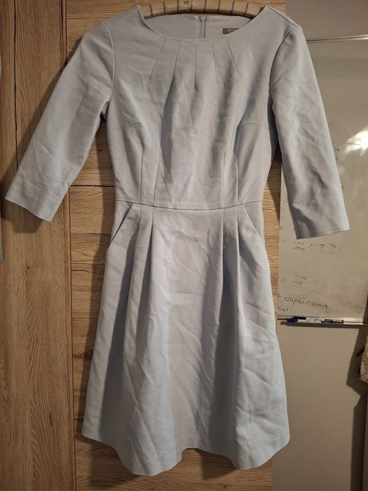 Błękitna taliowana sukienka orsay 34 36