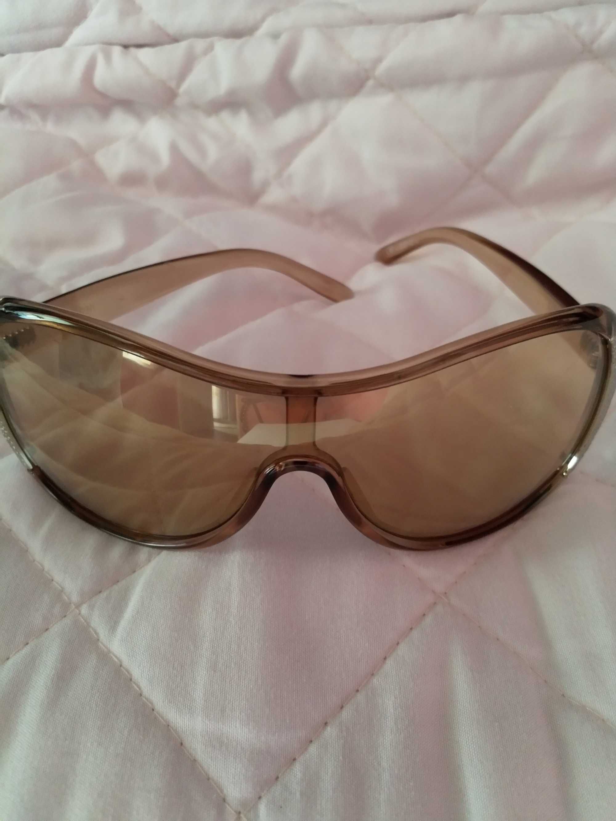 Oryginalne okulary damskie Yves Saint Laurent.