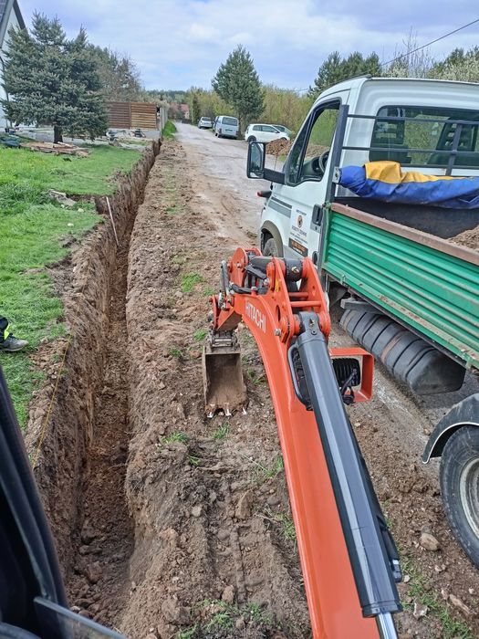 Usługi koparko ładowarką Kazimierza. Niwelacja. Koparka gąsienicowa