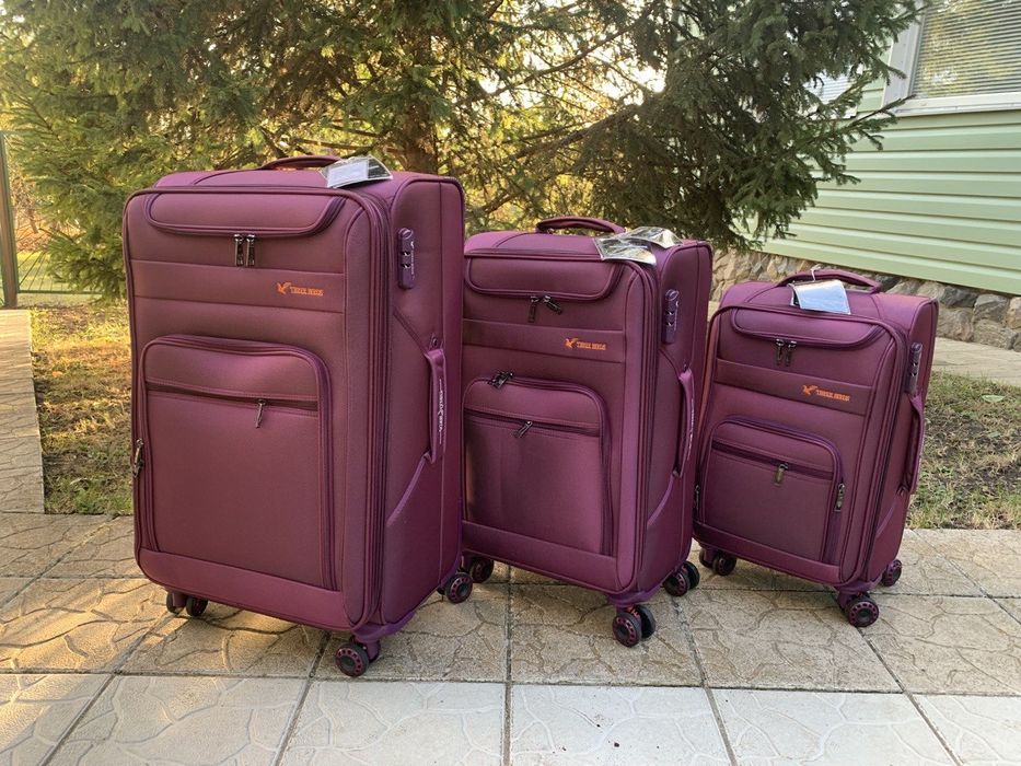 Чемодан дорожный на четыре колеса валіза на амортизаторах Three Birds