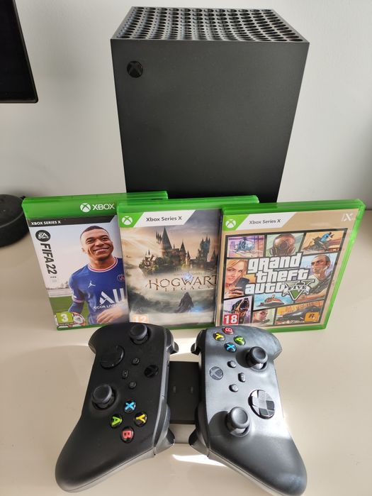 Xbox série x com 2 comandos e jogos