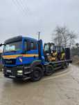 Pomoc drogowa transport maszyn laweta przerzut 18.600 kg  usługi