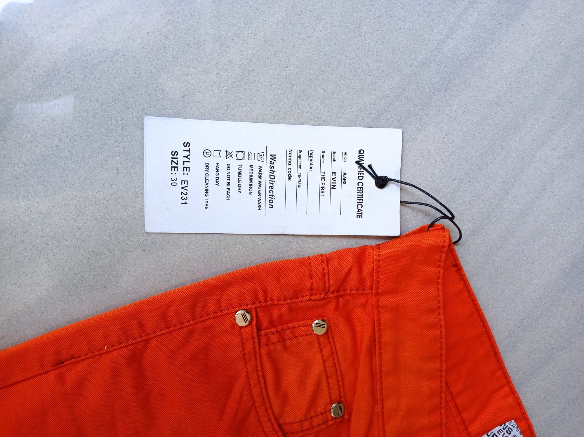 Nowe męskie pomarańczowe spodnie rozmiar 30