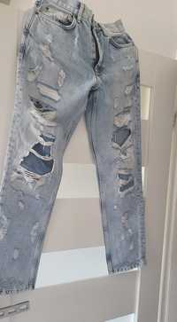Świetne męskie jeansy z dziurami 28