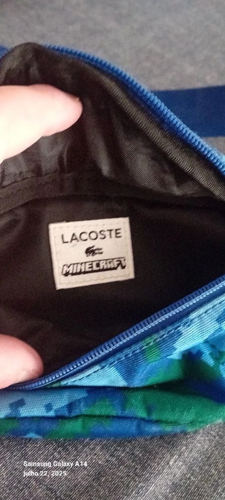 Bolsa lacoste edição especial leia bem promoções