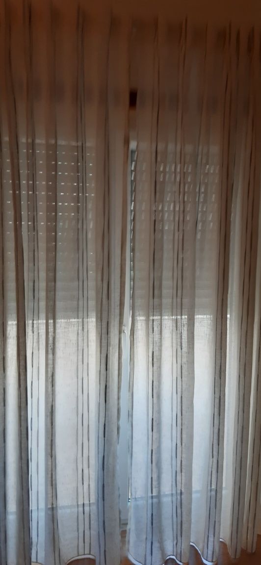 Cortinados e varão em inox