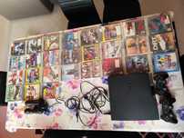 Ps3+27 variados jogos + 4 comandos + câmera