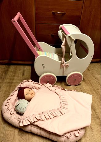 Lalka baby born, drewniany wózek  i wyprawka