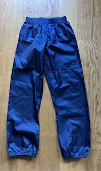 Spodnie przeciwdeszczowe sztormiak na deszcz Decathlon  140 10 lat