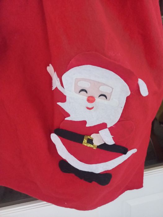 Saco de feltro  com aplicações  de pai natal.