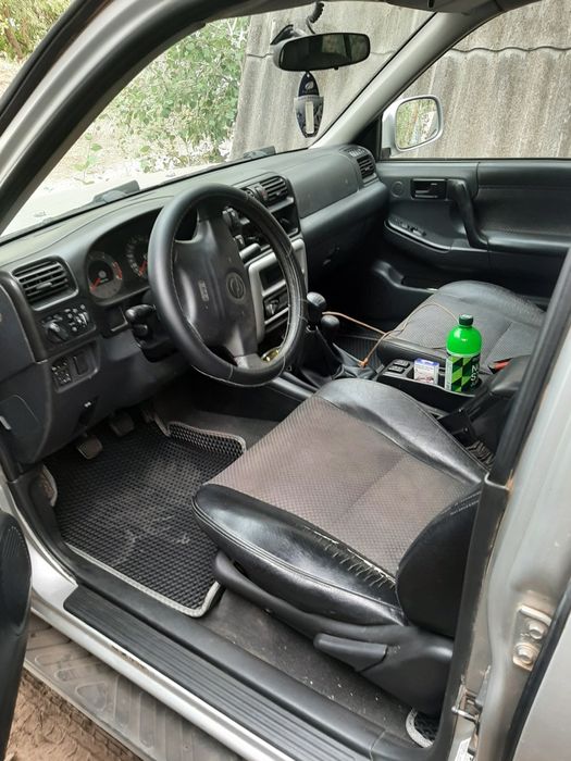 Опель фронтера               .