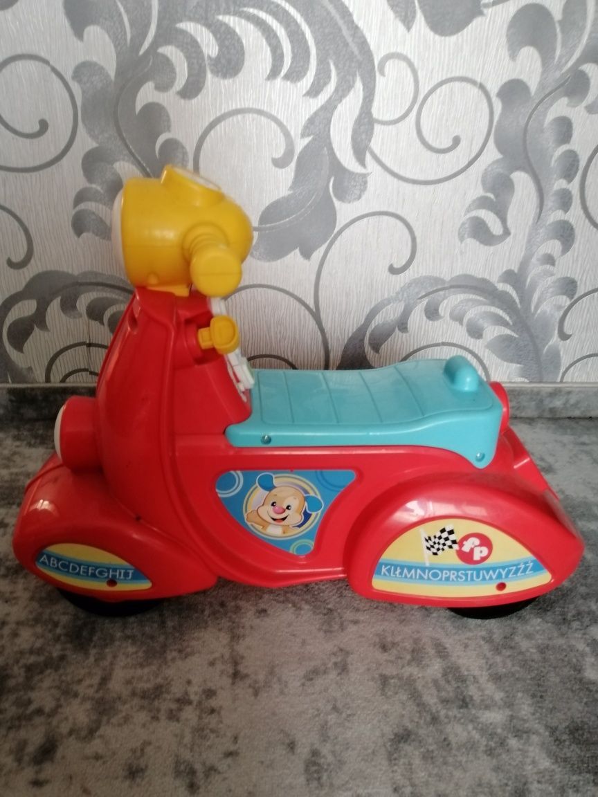 Interaktywny skuter jeździk motorek Fisher Price po polsku