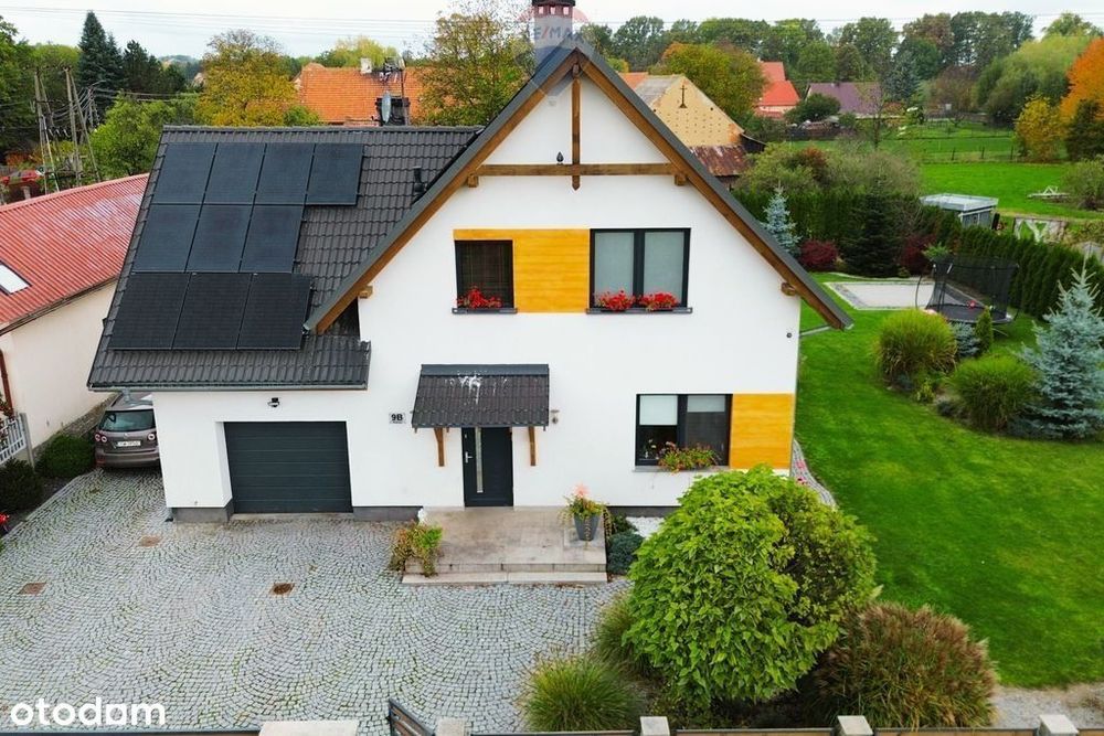 Nowoczesny, energooszczędny dom z pięknym ogrodem