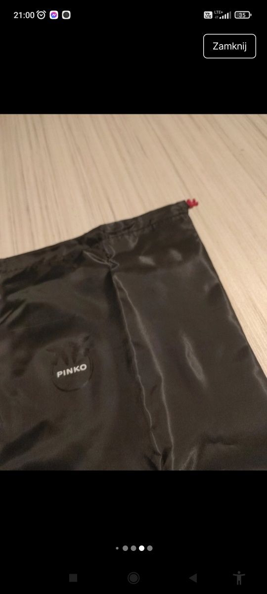 Nowy worek przeciwkurzowy marki Pinko.