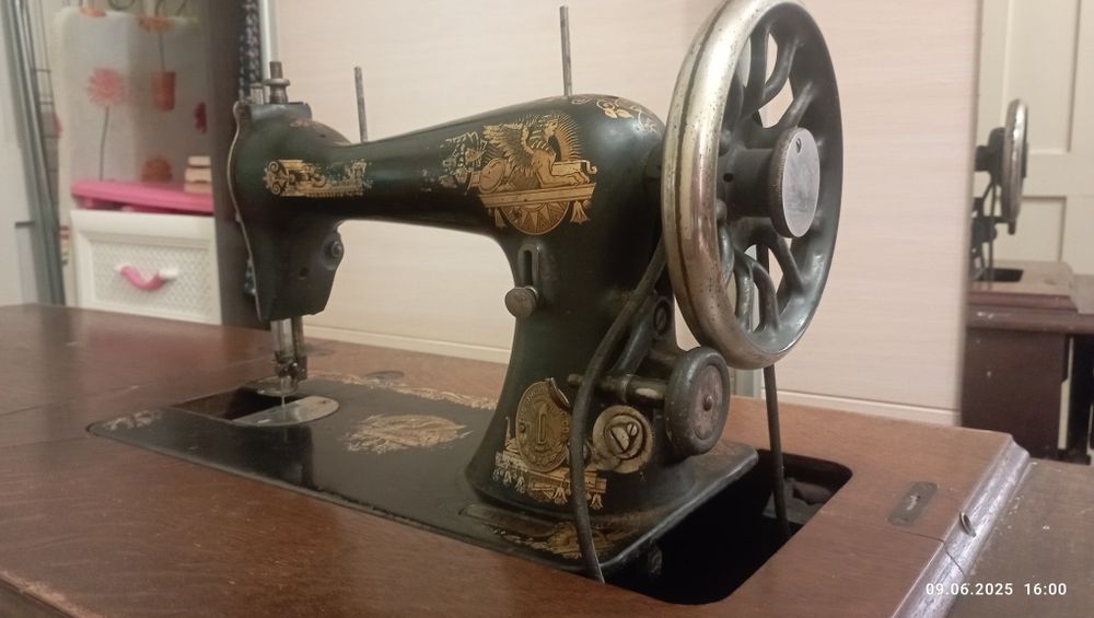 Швейна машинка singer