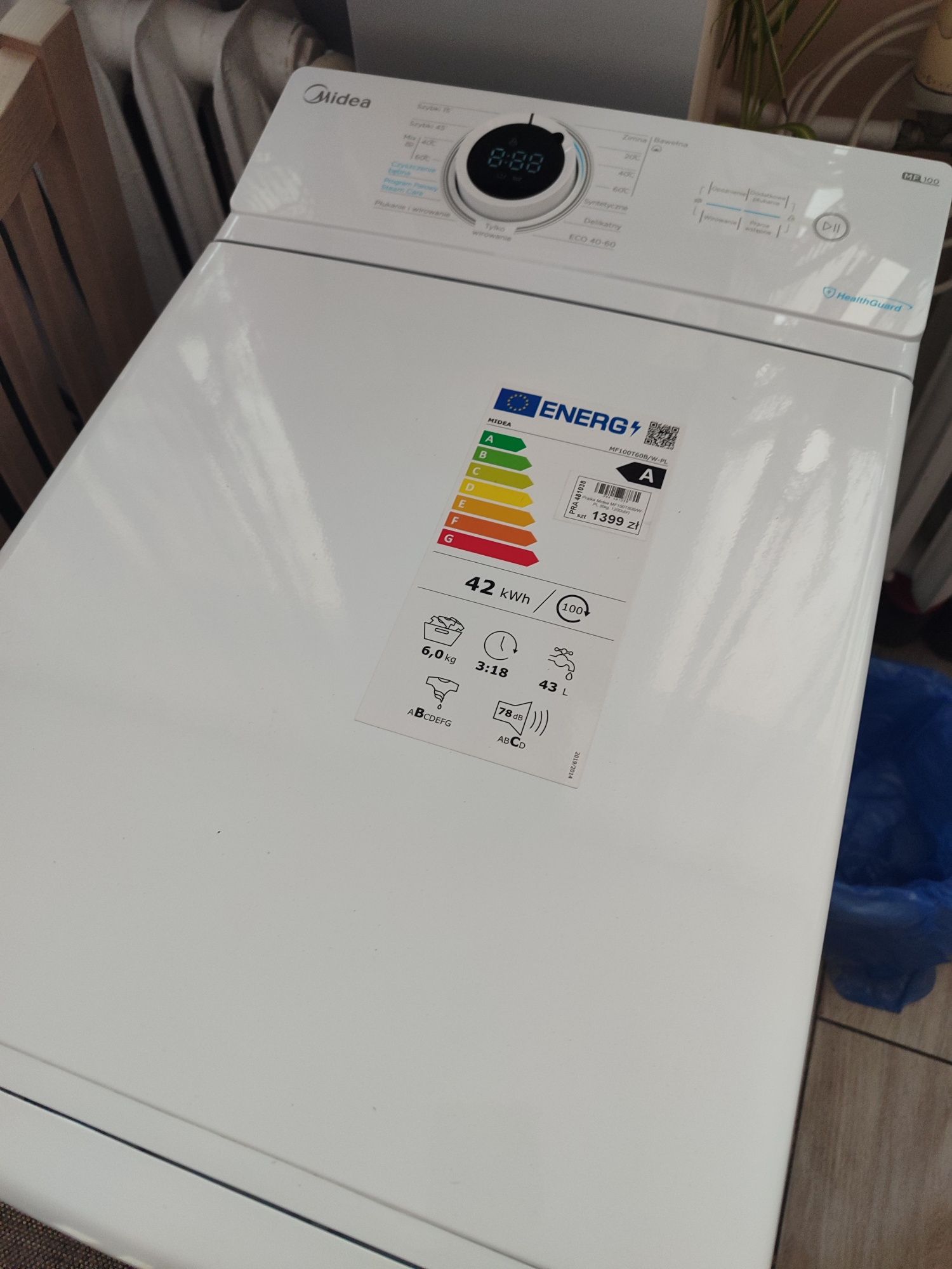 Nowa pralka Midea MF100T60B/W-PL.