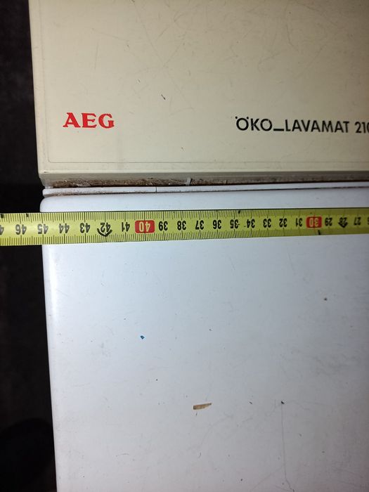 Пральна машинка вертикального завантаження