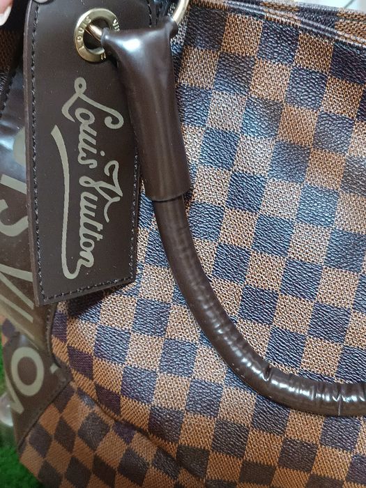 Брендова сумка Louise Vuitton.