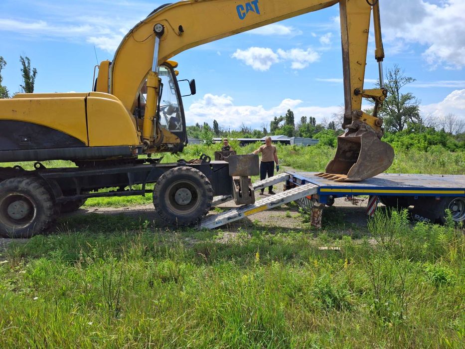 Повноповоротний ексковатор CAT M318C