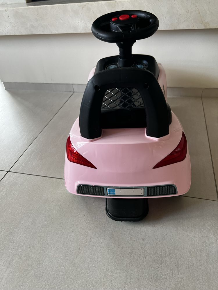 Samochodzik jeździk pchacz różowy efekty swietlne i dzwiekowe
