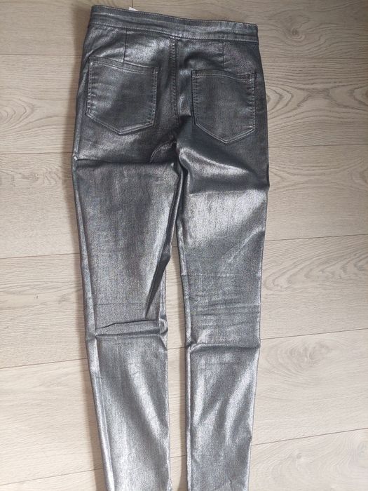 Srebrne jeansy damskie r.36 sinsay